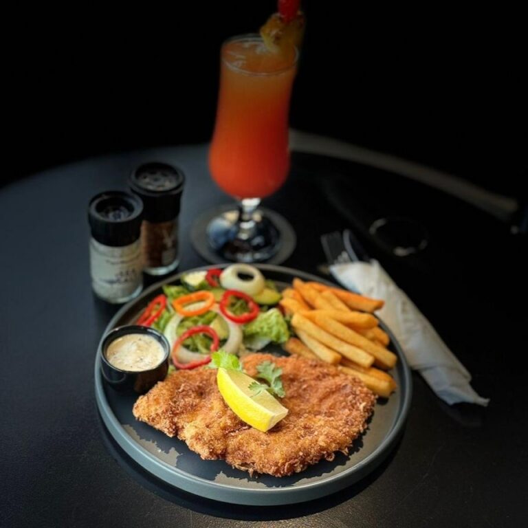 Crumbed schnitzel and cocktails at Match Café Muizenberg